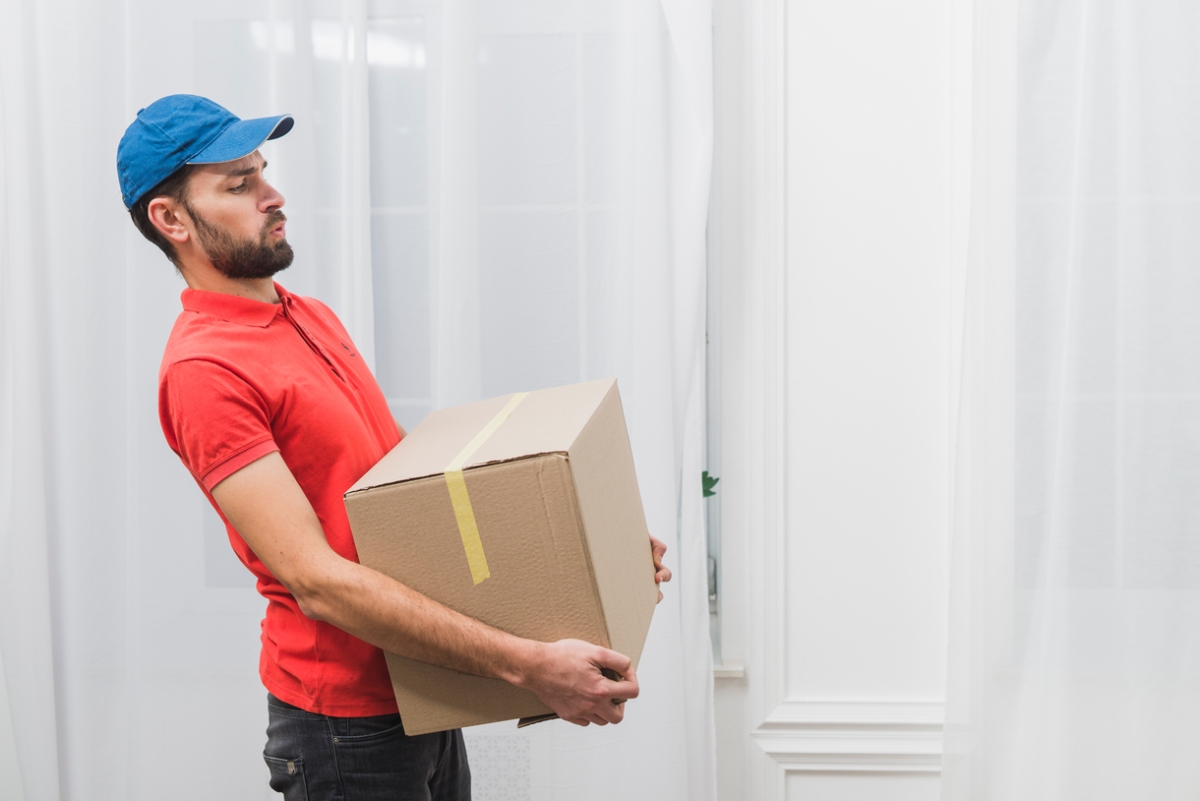 courier-delivering-heavy-parcel